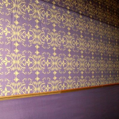 Brunel wall linings and a dado rail look like wallpaper in a large room