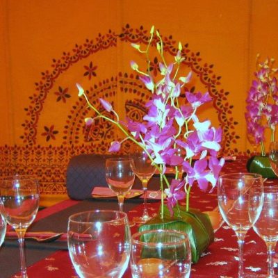 Saffron yellow marquee linings with orchids