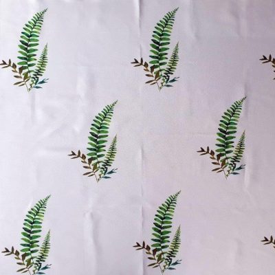 A marquee wall lining with a fern leaf printed design repeated