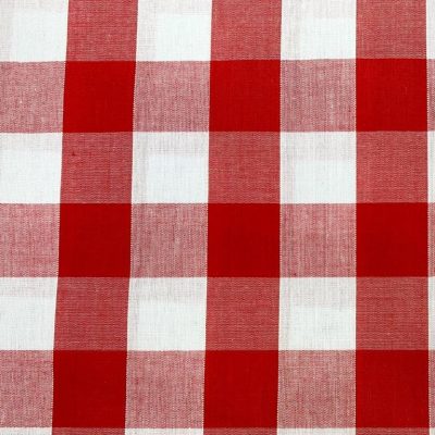 A close up sample of white and red gingham fabric