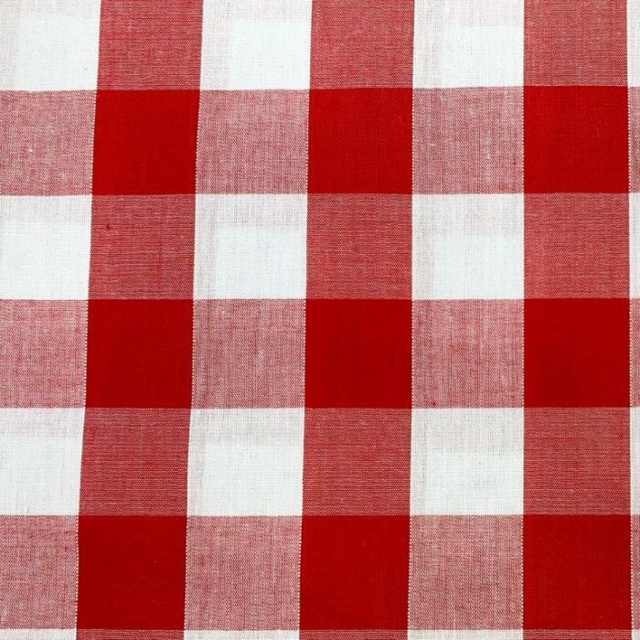 A close up sample of white and red gingham fabric