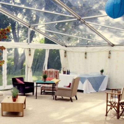 Jasmine Wall Linings dress a marquee with a clear marquee roof and chill out furniture
