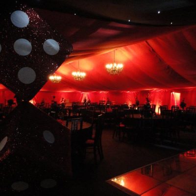 A marquee lined with Scarlet fabric wall linings