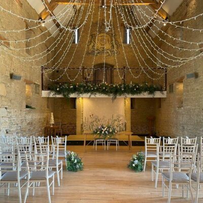 Oasis Events Botanical wall lining hanging in the Great Tythe barn